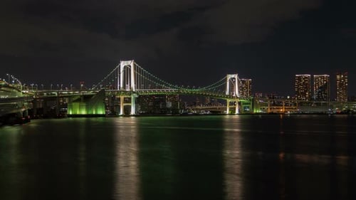 Timelapse Famous Illuminated Tokyo Rainbow Bridge at Night