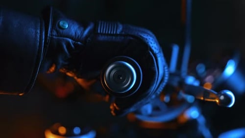 Motorcyclist Hand in Leather Road Gloves Twists Accelerometer Lever While Standing at City Traffic