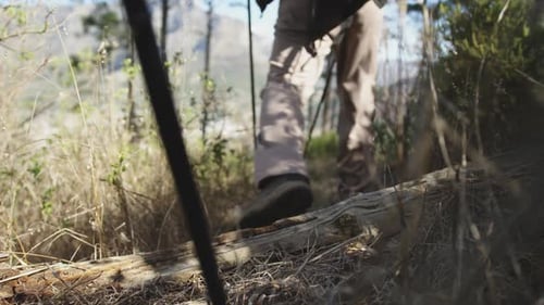 Close up view of senior couple walking on mountains