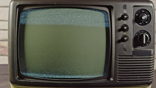 Vintage Television Showing Static on Screen