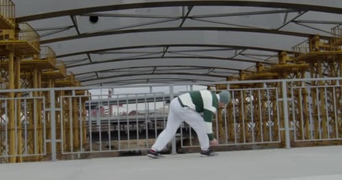 Young Adult Does Parkour in an Urban Setting