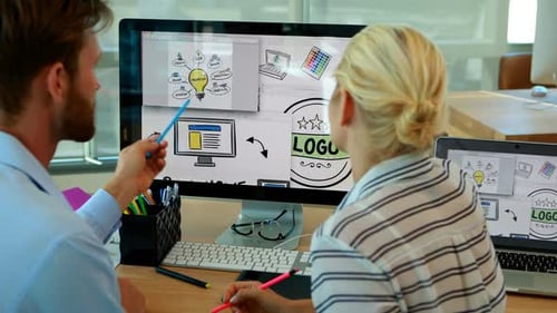 Two Designers Collaborating on a Logo Design