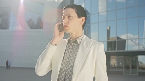 Experienced Businesswoman Answering Phone Call