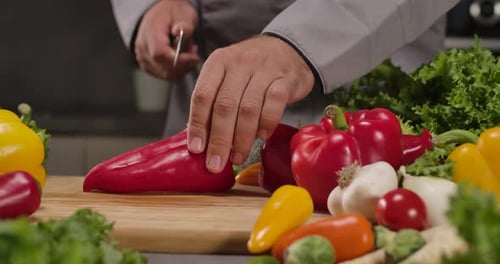Red Paprika on a Cutting Board