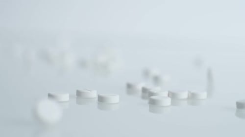 White Falling Pills
