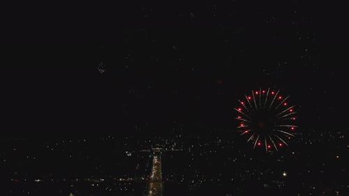 Closeup of Fireworks Over the Night City