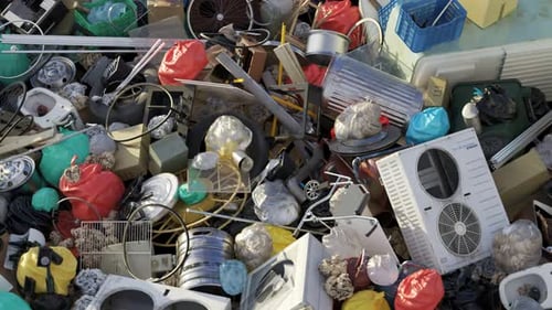 Environmental Pollution: Rotating Heap of Household Waste and Rubbish
