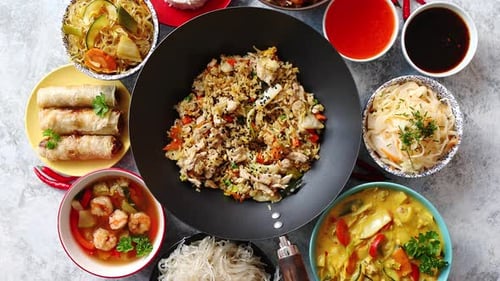 Asian Oriental Food Composition in Colorful Dishware