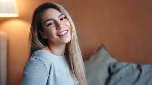 Happy Woman Smiling Indoors in Portrait