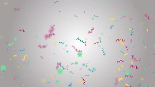 Buntes Konfetti fällt in Zeitlupe über hellem Hintergrund