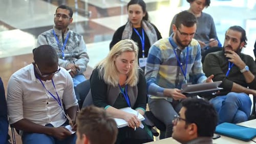 Group of Adults at a Corporate Presentation