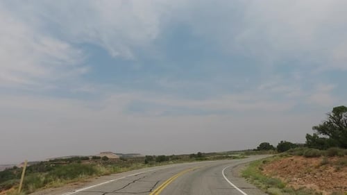 POV driving down scenic road in South West USA