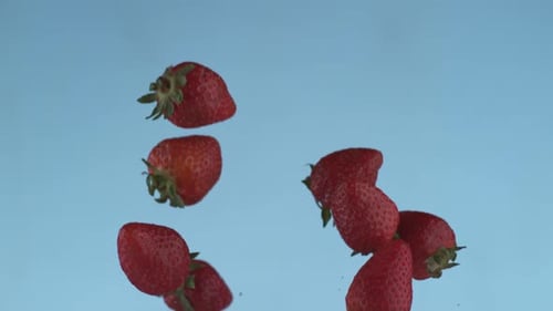 Strawberries flying in slow motion, shot with Phantom Flex 4K at 1000 frames per second