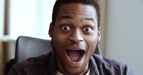 Man Looks Amazed, Excited, and Surprised