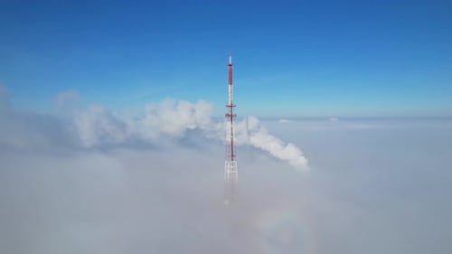High tower above the fog