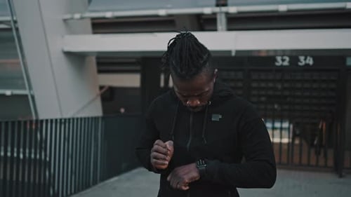 Athletic Man Jogging in an Urban Setting