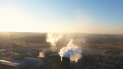 Aerial View Pillar of Smoke Emitting From Plant Pipes