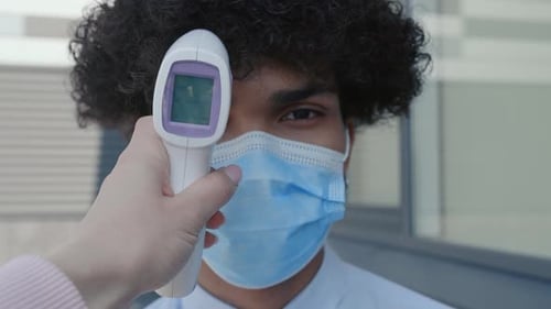 Temperature Check with Contactless Thermometer and Face Mask