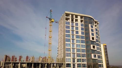 High residential apartment building under construction. Real estate development.