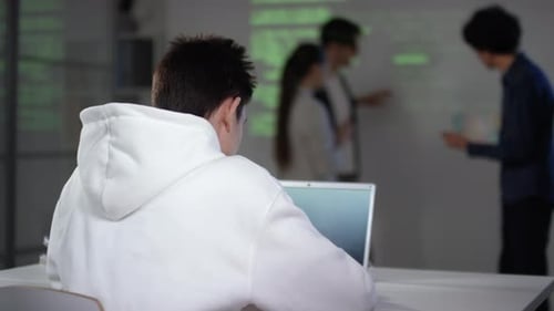 Students Working At Computer Class
