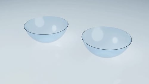 Pareja de lentes de contacto en el piso de reflexión limpia en el laboratorio
