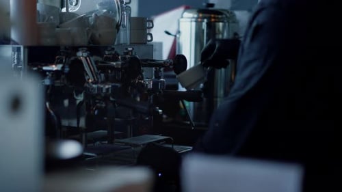 Barista Prepares Coffee Drink on Espresso Machine
