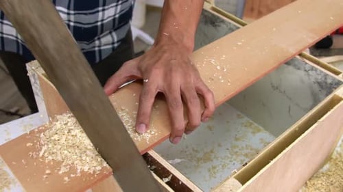 Carpenter Working on Wood Craft at Workshop