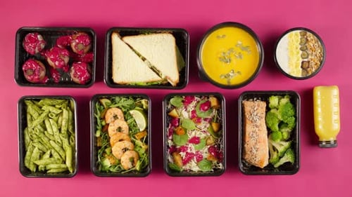 Food Delivery Top View Take Away Meals in Disposable Containers on Pink Background