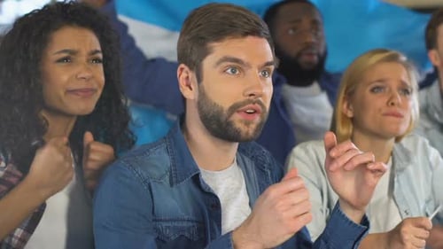 Excited Sports Fans React to Game