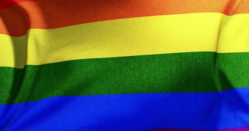 Realistic Waving Rainbow Pride Flag Background