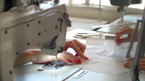 Designer of Clothes Makes an Outline of Clothes with a Felttip Pen