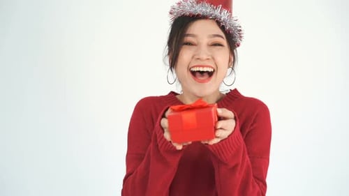 Joyful Woman Presents Red Holiday Gift