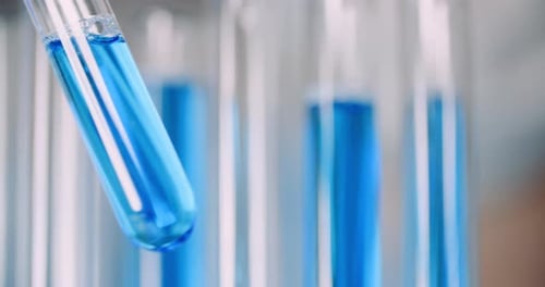 Test Tube with Blue Liquid in Lab Close Up
