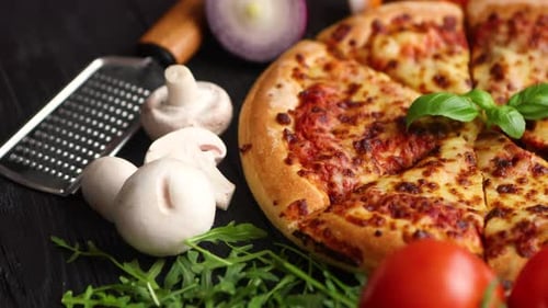 Fresh Baked, Hot American Style Pizza with All Various Ingredients on Side