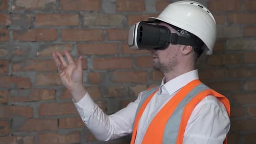 Construction Worker Using VR Headset on Site