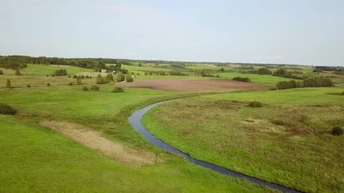 Agricultural Lands Located Along the River in Perfect Weather. Aerial Survey