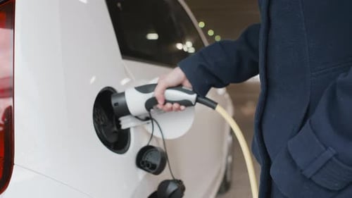 Disconnecting Charging Plug from Electric Vehicle