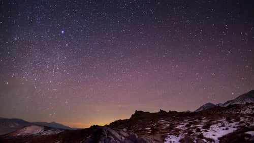 Starry Night Sky Time-Lapse Over Mountains