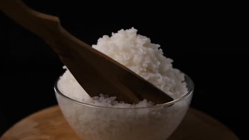 Fresh Cooked Rice in a Bowl with Spoon