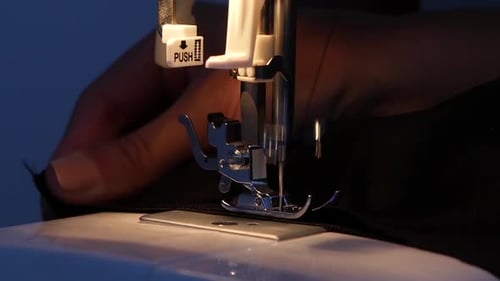Sewing Machine Stitches Dark Fabric Close Up