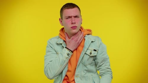 Young Adult Male Experiencing Painful Sore Throat