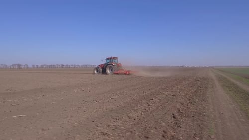 Tractor Plowing In Spring