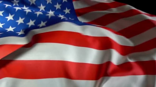 American Flag Waving Against Black Background