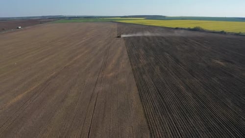 Tractor Tilling Large Rural Agricultural Field