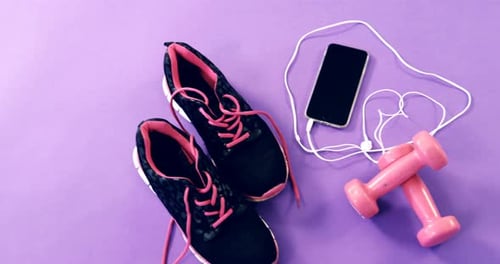 Workout Gear Flat Lay on Purple Background