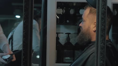 Barber Gives Man a Beard Trim With Electric Razor
