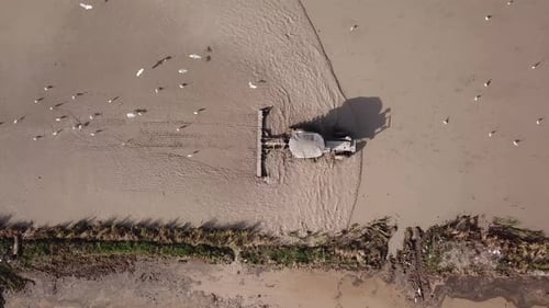 Aerial tractor plow during cultivation of the soil at Malaysia
