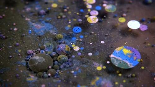 Abstract Colorful Acrylic And Food Paint Bubbles On Water
