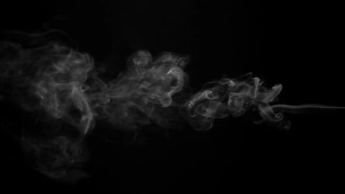 Wispy Smoke Flowing Across Black Background