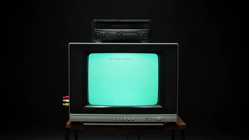 Old Retro Square Television with Blue Screen on Black Background